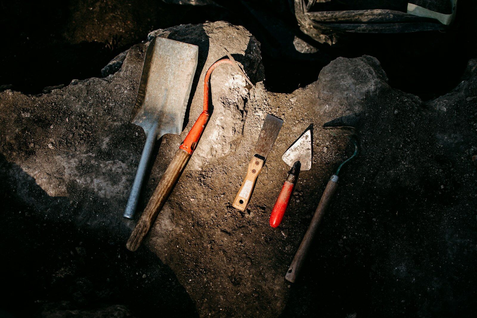 Tools are laying out on a piece of wood